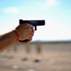 File photo of a Glock being fired at a gun range